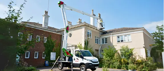 using our cherry picker on a commercial gutter cleaning job in Oxford