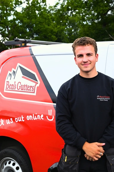 one of our gutter cleaners standing by company vehicle in Oxford